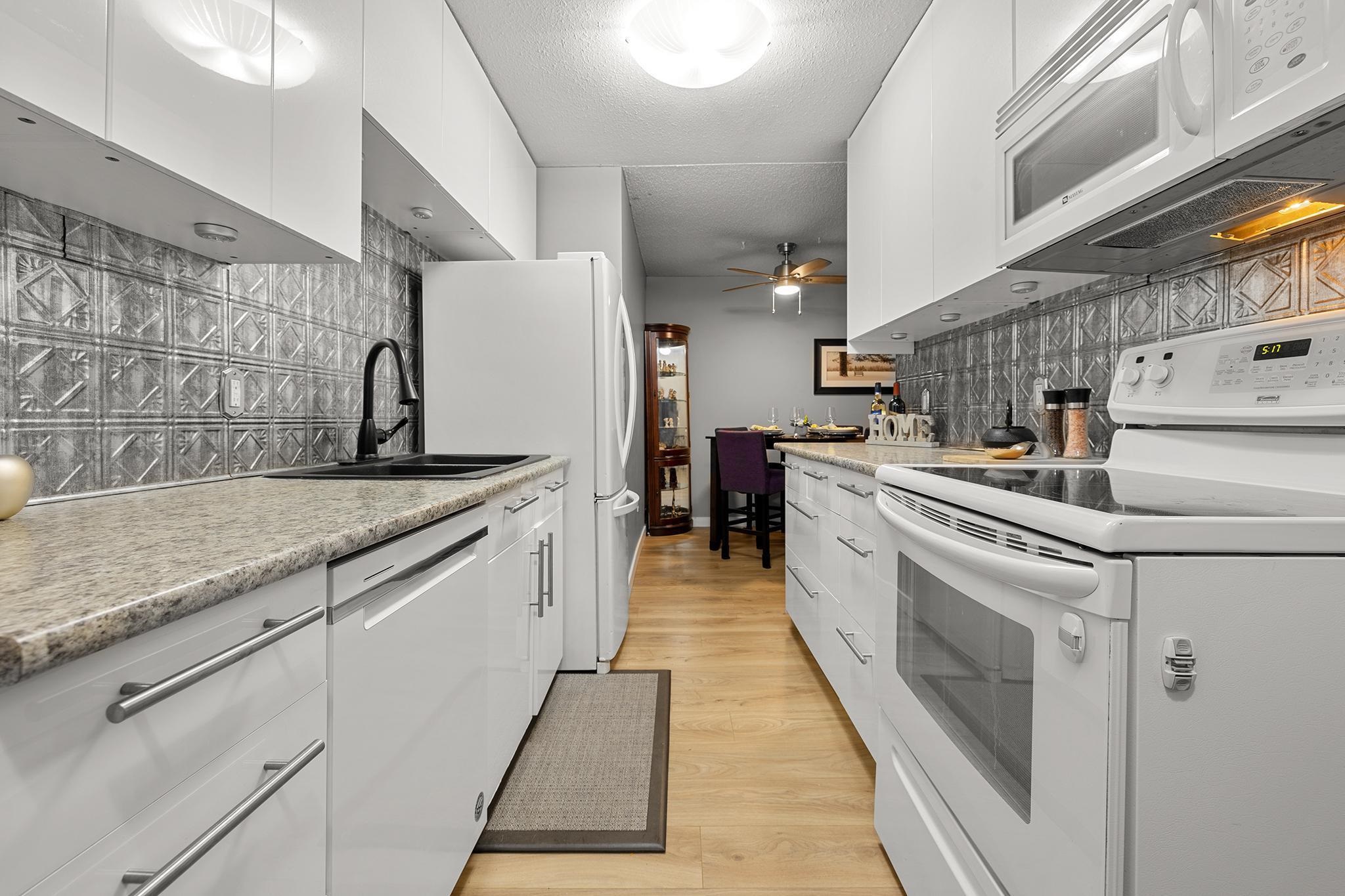 201 3921 CARRIGAN COURT 11